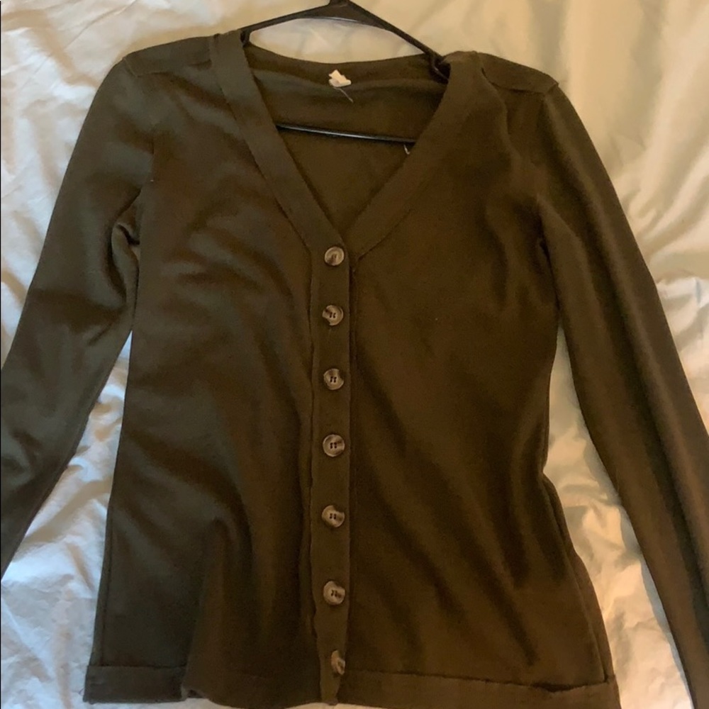 A cute dark green top  ONLY ONE TIME!!